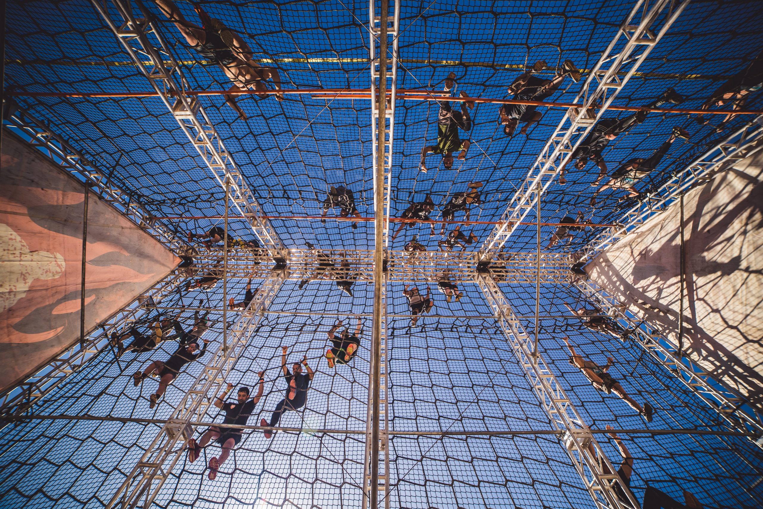 People climbing on net