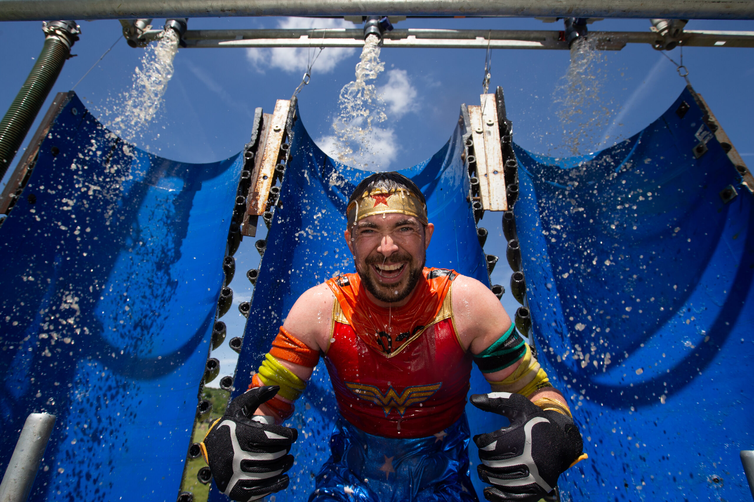 smiling man on obstacle at London West event